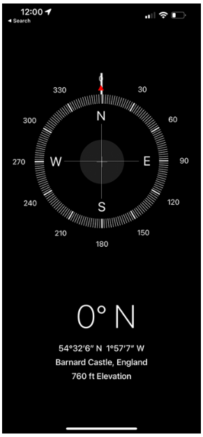 The Compass app says the iPhone is pointing due north.